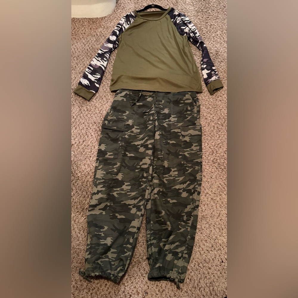 Camo outfit pants are a large and top is extra large